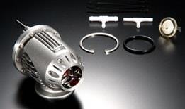 HKS Super SQV4 universal blow off valve with black and silver finish, mounted on a car engine.