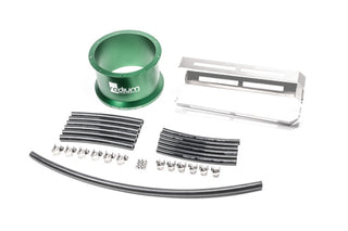Radium Engineering FCST-X 3.7-inch 1.2L fuel tank extension kit with hoses and fittings, mounted on a vehicle.