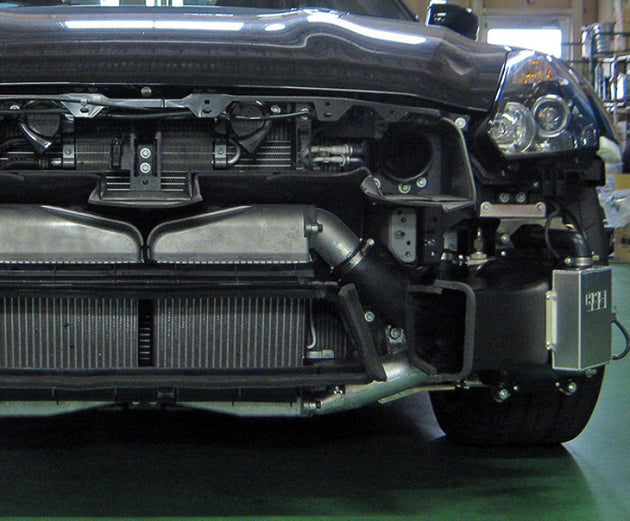 HKS DCT fluid cooler for R35 GT-R MY11-15, black oil cooler with fins and hoses, designed for transmission cooling.