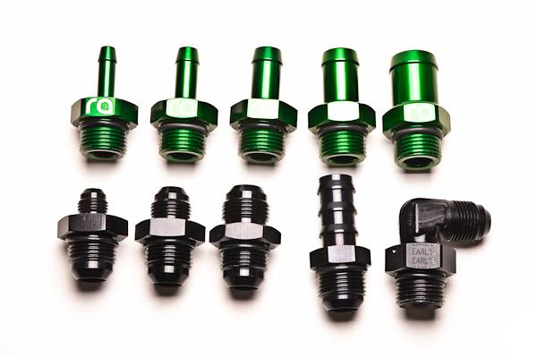 Radium Engineering Duckbill Valve fitting with black rubber body and metal clamp, designed for automotive or fluid system applications