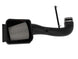 aFe Magnum FORCE Stage-2 Pro Dry S cold air intake system installed in a 2009-2014 Chevrolet Silverado or GMC Yukon engine bay