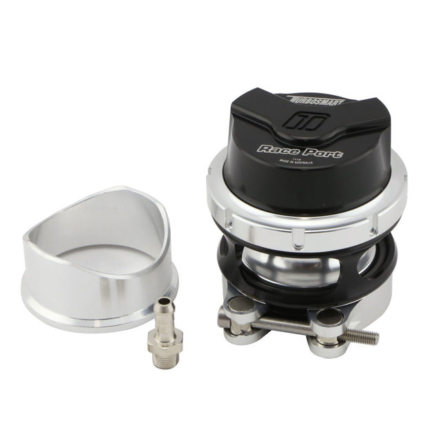 Black Turbosmart Gen V RacePort blow off valve installed on a turbocharged engine, showcasing its sleek design.