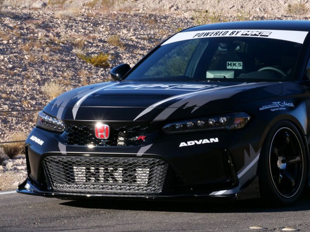 HKS Civic Type R FL5 intercooler kit showing the large aluminum intercooler with hoses and mounting brackets.