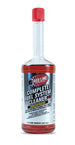 Red Line SI-1 Fuel System Cleaner 15oz bottle with label, designed to improve fuel system performance and cleanliness.