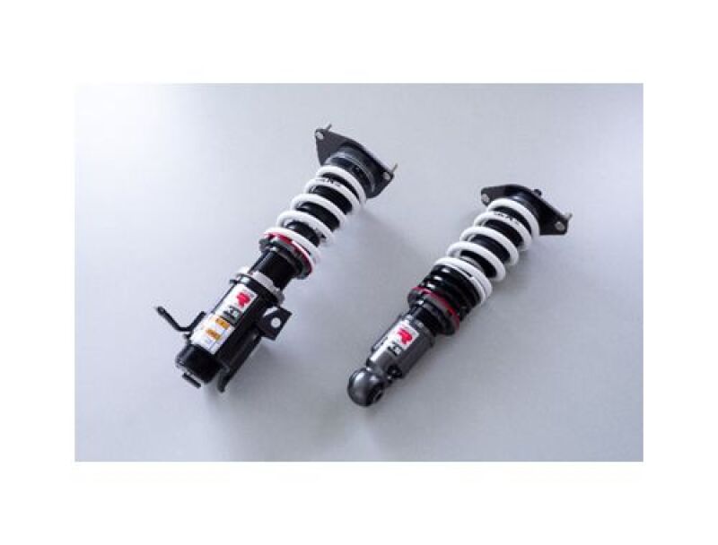 HKS Hipermax R ZN8 coilover kit installed on a vehicle, showcasing adjustable suspension components and branding details.