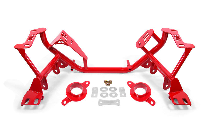 Red BMR Ford Mustang K-Member crossmember with spring perches for 1979-1995 models, featuring sturdy construction and mounting points.