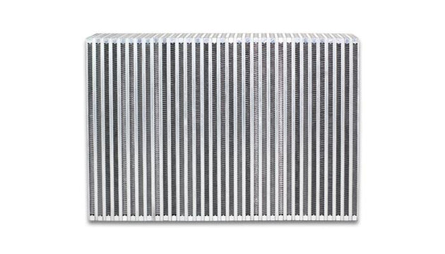 Vibrant vertical flow intercooler core, 12-inch wide, 8-inch high, 3.5-inch thick, with metal fins and end tanks visible.
