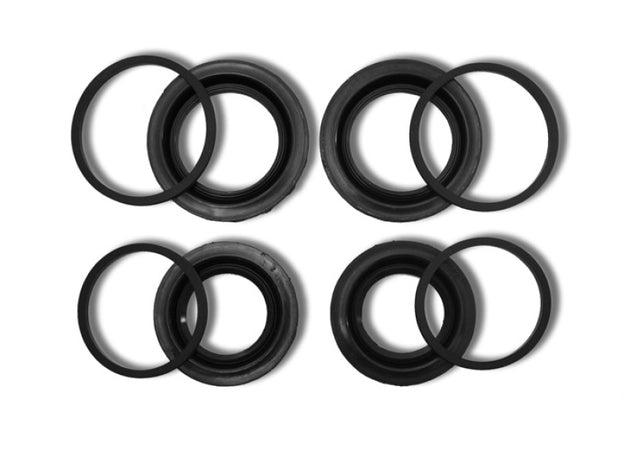 GiroDisc Porsche 911 Carrera S/4S rear brake caliper rebuild kit with pistons, seals, and hardware for 996 and 997 models.