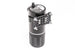 Radium Engineering Competition Catch Can XL VTA/VTE oil catch can with hoses and mounting bracket for automotive engine ventilation.