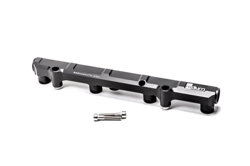 Radium Engineering VW/Audi EA888 fuel rail for port injection, shown in black with metal fittings and mounting hardware.