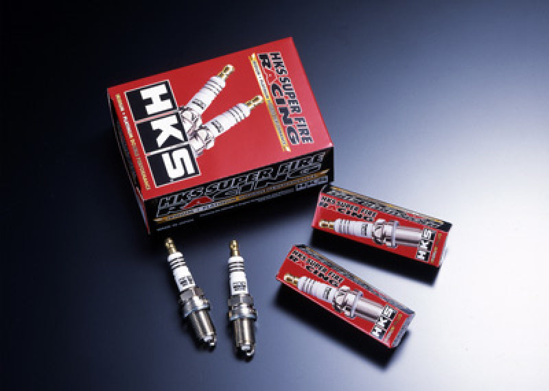 HKS Super Fire Racing M45iL spark plug showing metal tip and threaded metal body, designed for high-performance engines.