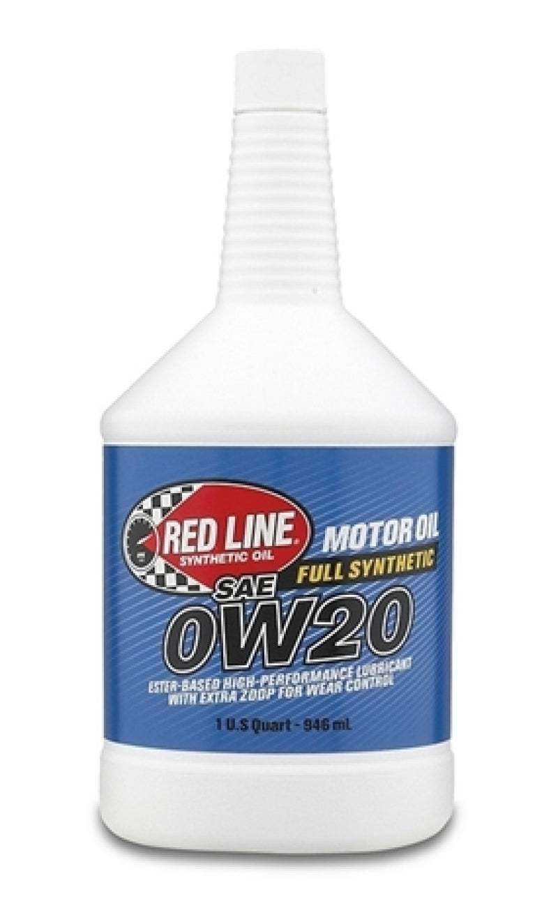 Red Line 0W20 motor oil quart bottle with label, showcasing high-performance engine oil for vehicles.