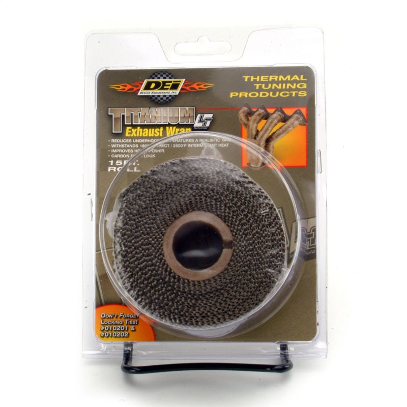 DEI Titanium Exhaust Wrap 2in x 15ft wrapped around automotive exhaust pipe for heat insulation and protection.