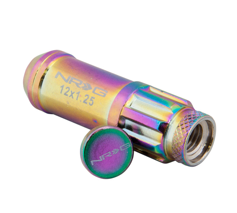NRG 700 Series M12 x 1.5 steel lug nut set with dust cap covers, locks, and lock socket in neochrome finish on a wheel.