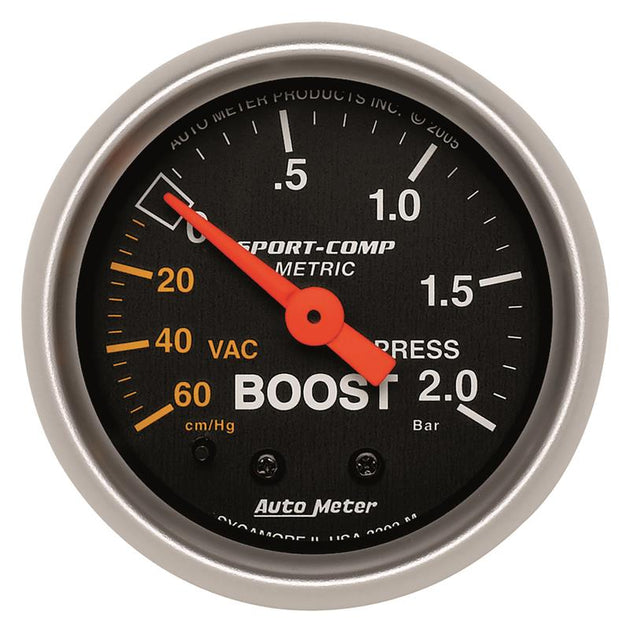 AutoMeter Sport-Comp 52mm mechanical boost gauge displaying pressure levels from 0 to 2.0 bar in a sleek black dial.