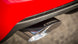 Polished CORSA Performance catback exhaust system for Chevrolet Camaro SS 2011-2015 with 6.2L V8 engine, showing the exhaust tips.