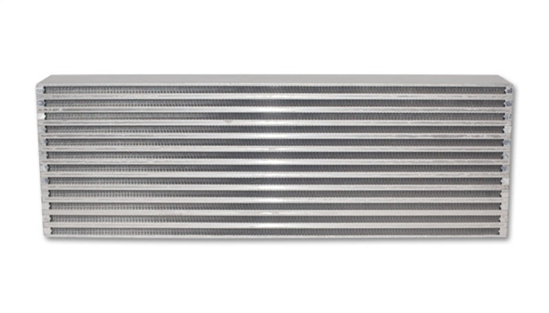 Vibrant intercooler core measuring 24x8x3.5 inches, featuring vibrant heat exchange fins and metal end tanks for efficient cooling.