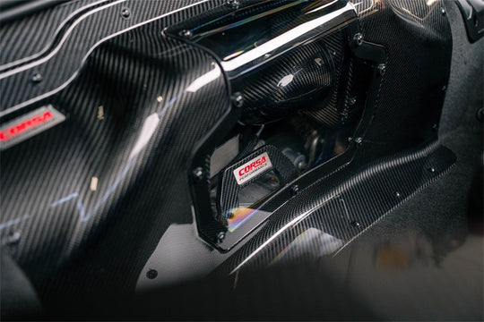 Corsa 23+ Chevy C8 Z06 carbon fiber air intake with DryTech filter installed, enhancing engine airflow and performance.