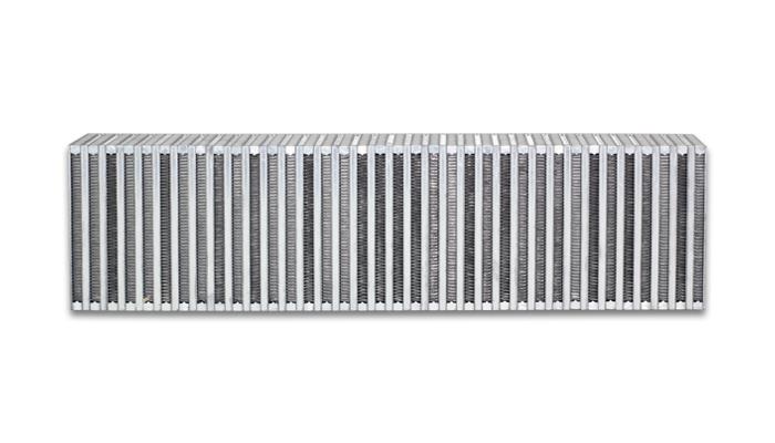 Vibrant vertical flow intercooler core, 24-inch wide, 6-inch high, 3.5-inch thick, with fins and mounting points for automotive cooling