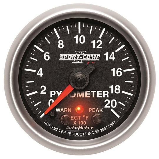 AutoMeter Elite 52.4mm pyrometer gauge displaying temperature from 0 to 2000°F with electronic control features.