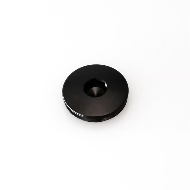 Black Turbosmart BOV Kompact Port Blanking Plug for blow-off valve accessories, designed for precise engine boost control.