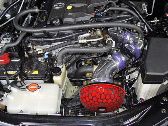 HKS RS Roadster NCEC LF-VE cold air intake system showing the sleek black intake tube and filter for Nissan vehicles.