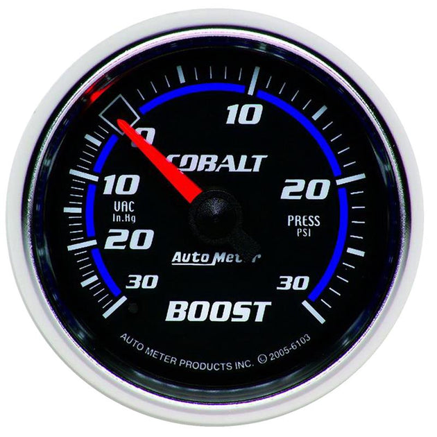 AutoMeter Autometer Cobalt 52mm mechanical boost gauge with 30psi pressure readings, mounted on a vehicle dashboard.
