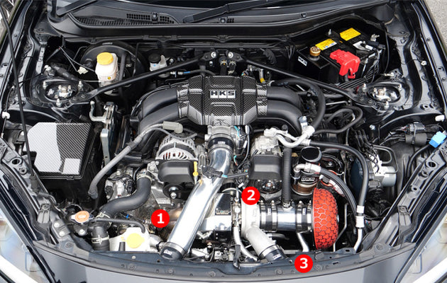 HKS bolt-on turbo kit GTIII-RS for ZN8/ZD8 with A/R 0.6, includes turbocharger components and piping, ready for installation.