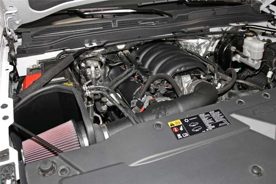 K&N 63 Series AirCharger cold air intake kit for Chevy/GMC Silverado/Sierra 1500 V8 engines, featuring a high-flow air filter and intake tubing.