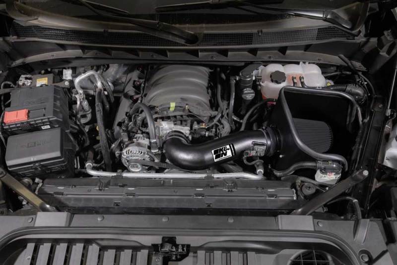 K&N 2019 Chevrolet Silverado 1500 5.3L V8 black cold air intake kit installed in engine bay, showcasing high-performance air filter and tubing.
