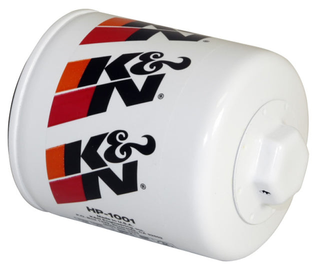 K&N Performance Gold Oil Filter for Chevy, Pontiac, GMC, and Buick vehicles, showing the filter with branding and metal construction.