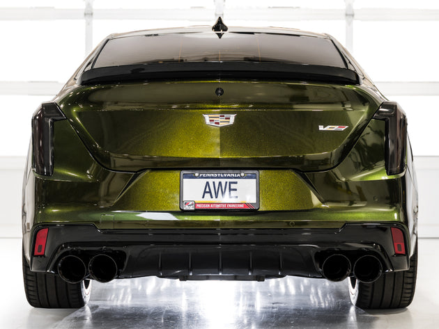 AWE Tuning 2021+ Cadillac CT4-V Blackwing catback SwitchPath exhaust with diamond black tips, showcasing the sleek exhaust tips and piping.