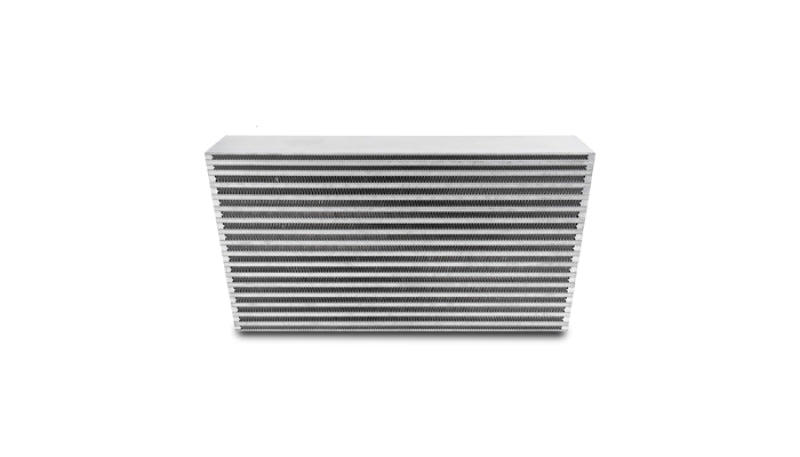 Vibrant intercooler core measuring 20x11x3.5 inches with vibrant cooling fins and metal end tanks, designed for high-performance turbo systems.