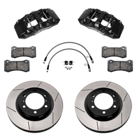 Wilwood 24-25 Toyota Tacoma Aero6-DM big brake kit with 13.38-inch rotors, black calipers, and brake lines installed on front wheels
