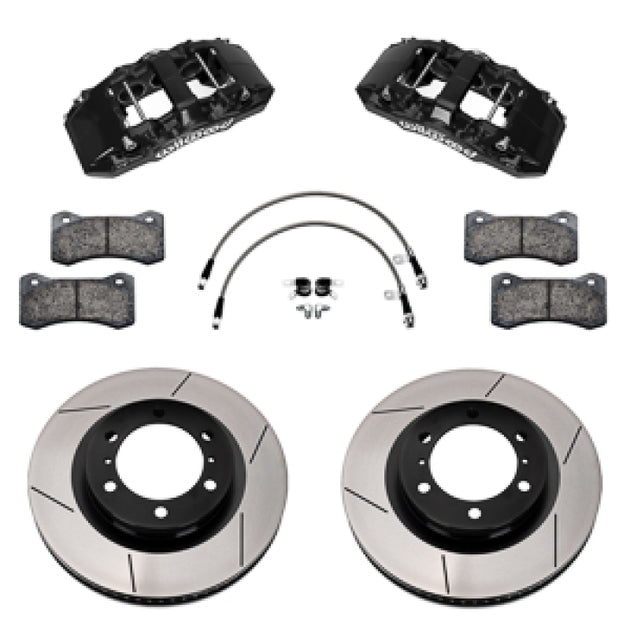 Wilwood 24-25 Toyota Tacoma Aero6-DM big brake kit with 13.38-inch rotors, black calipers, and brake lines installed on front wheels