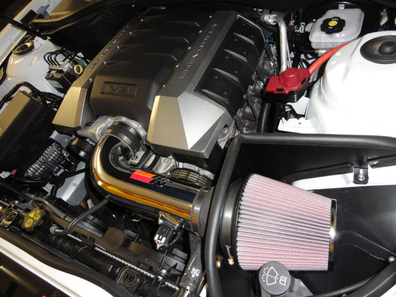 K&N Engineering Polished Typhoon Short Ram Cold Air Intake for 2010 Camaro 6.2L V8 engine, showing the polished metal intake components.