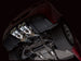 AWE Tuning axle-back exhaust for 2005-2007 C6 Chevrolet Corvette 6.0L with chrome silver tips, showcasing the exhaust tips and piping.