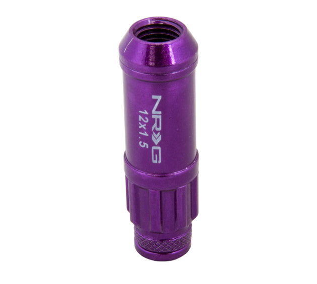 NRG 700 Series M12 x 1.5 steel lug nuts with purple dust caps, lock set, and lock socket for automotive wheels.
