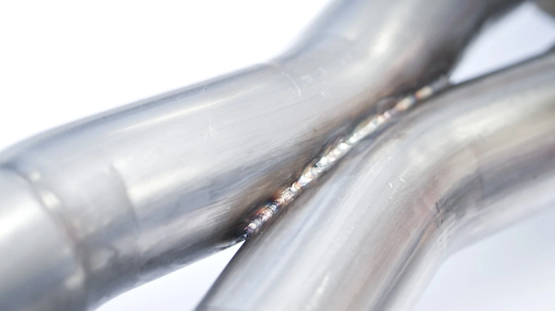 Stainless Works 3-inch dual turbo muffler cat-back exhaust system for CTSV, featuring polished stainless steel pipes and dual mufflers.