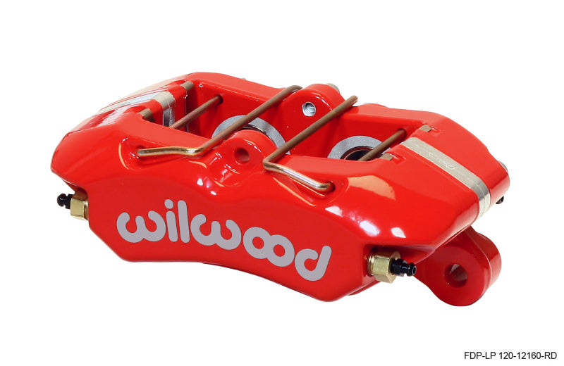 Wilwood Dynapro low-profile red brake caliper with 1.12-inch pistons and .81-inch disc for high-performance vehicle braking.