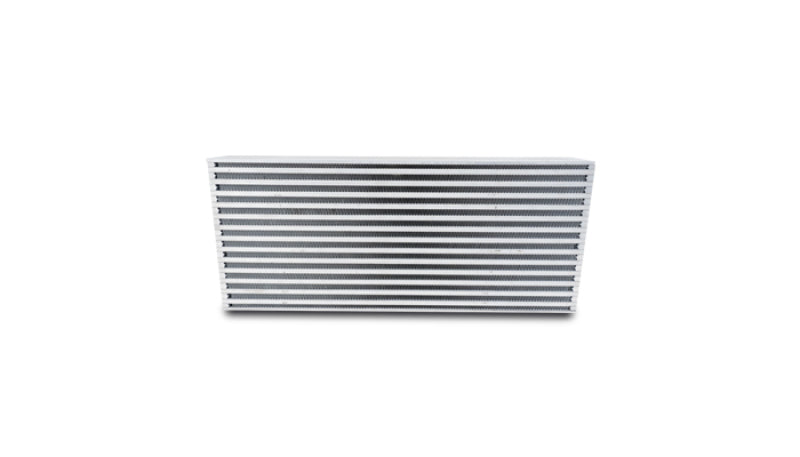 Vibrant intercooler core measuring 24x8x3.5 inches, showing its vibrant cooling fins and metal frame for automotive performance.