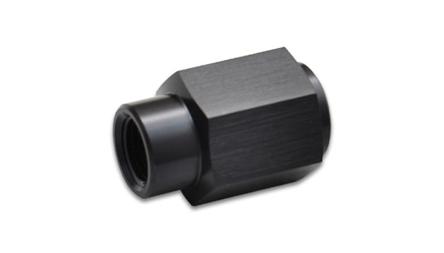 Vibrant LS engine fuel pressure adapter fitting showing metal construction and threaded connections for fuel system installation.