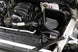 K&N Engineering cold air intake kit installed in a 2019 Chevrolet Silverado 1500 5.3L V8, featuring black performance air filter and intake tube