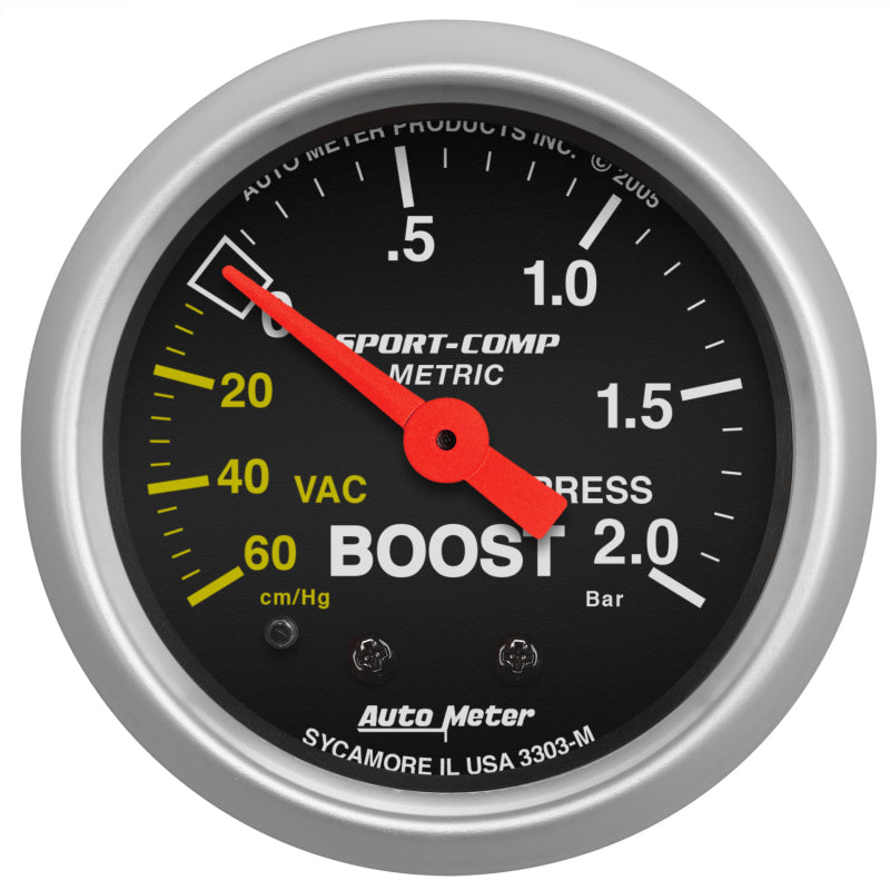 AutoMeter Sport-Comp 52mm mechanical boost gauge displaying pressure readings in bar and Hg for automotive performance.