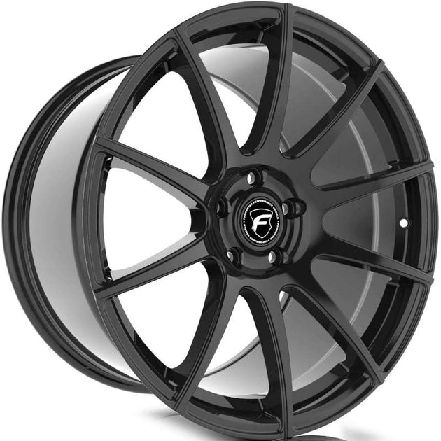 Forgestar CF10 20x12 cast wheel in gloss black with 5x120.65 bolt pattern, ET50 offset, and 8.5-inch backspacing.