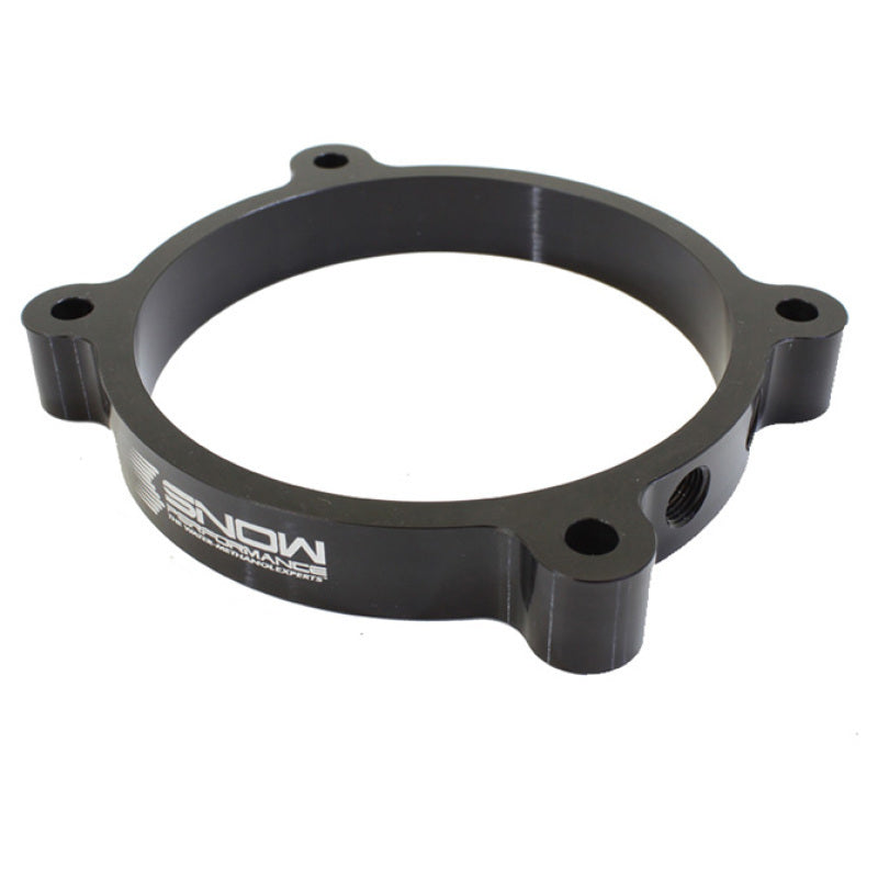 Snow Performance 102mm LS throttle body water meth injection plate showing detailed metal construction and mounting features.
