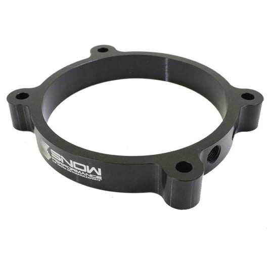 Snow Performance 102mm LS throttle body water meth injection plate showing detailed metal construction and mounting features.