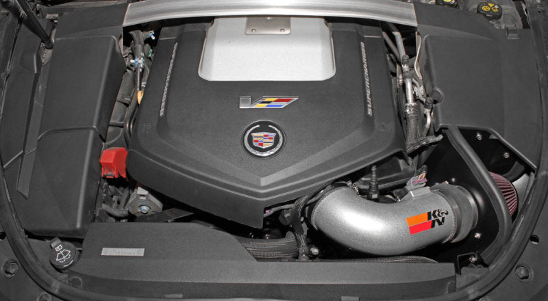 K&N Engineering cold air intake for 2009-2015 Cadillac STS-V 6.2L V8 engine, featuring the Typhoon performance intake system.