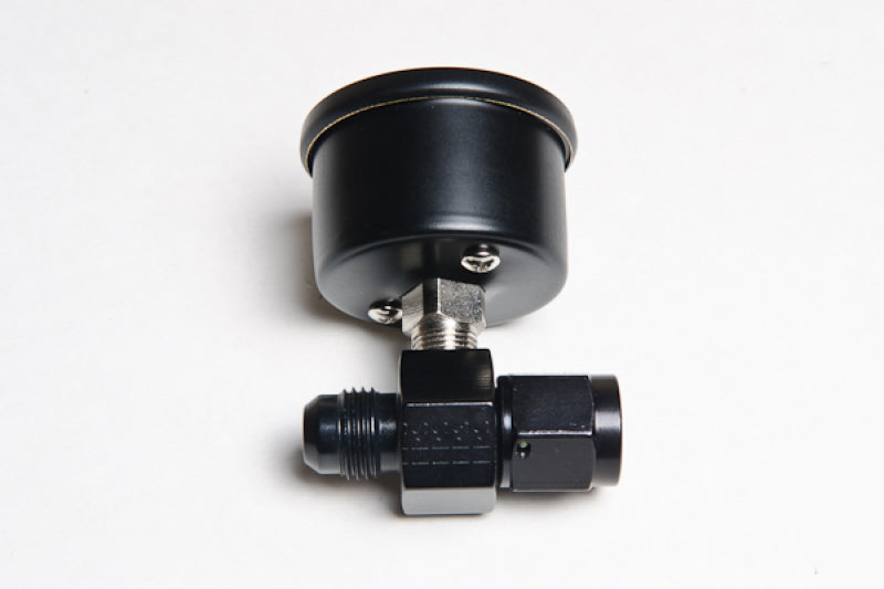 Radium Engineering fuel pressure gauge with 6AN inline adapter, clear dial displaying pressure levels in a high-performance engine setup.