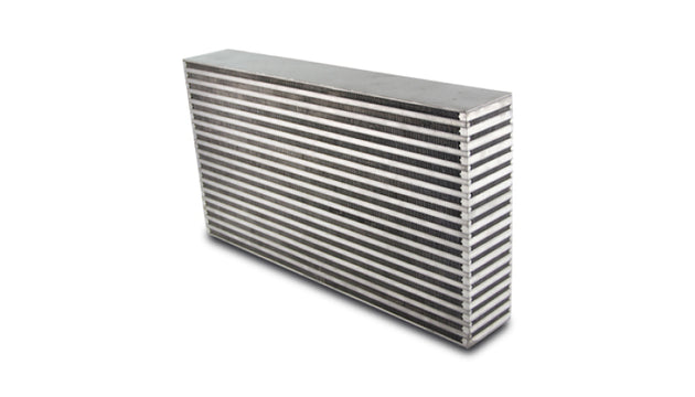 Vibrant horizontal flow intercooler core measuring 22x11.75 inches with a 3.5-inch thickness, featuring vibrant color and detailed fins.